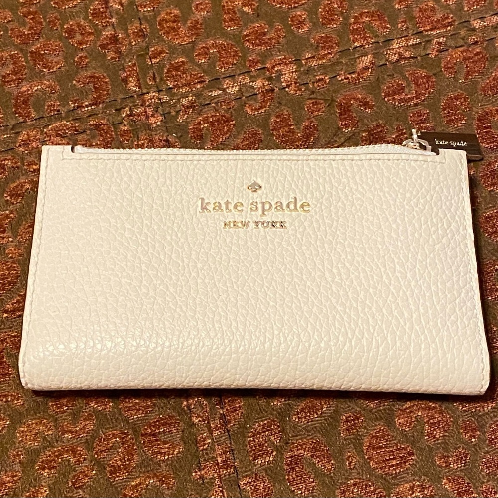 Kate Spade Leila bifold small slim wallet in parchment